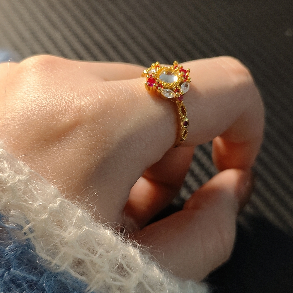 Elegant Gold and Red Gemstone Ring